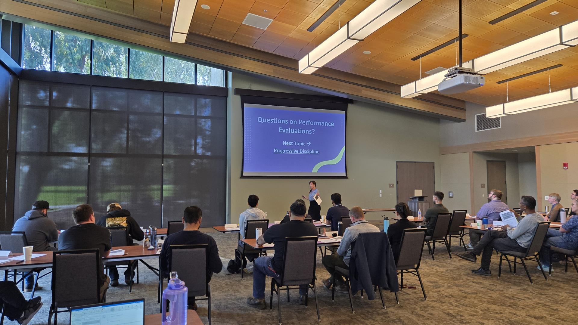 HR professional hosting supervisor training.